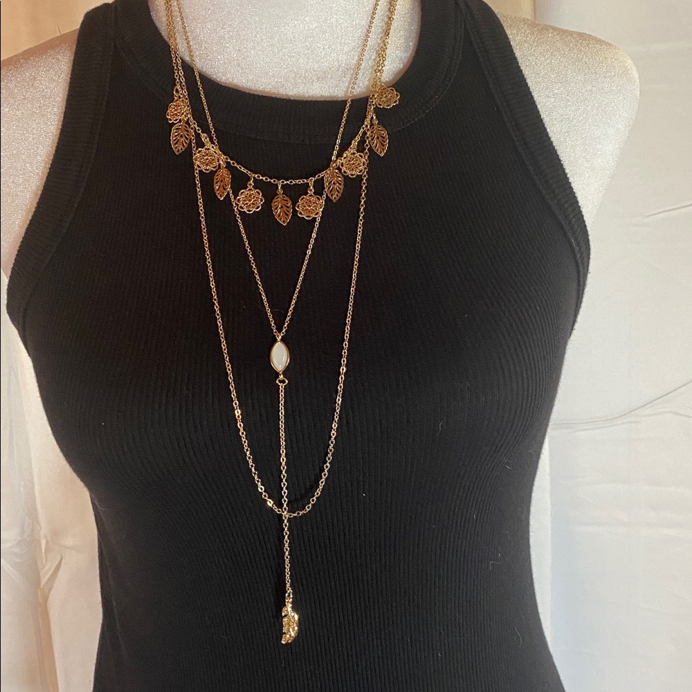 Gold tone layered three tier leaf necklace